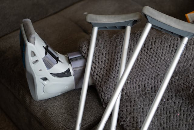 Hurt in a slip and fall accident, crutches, air boot